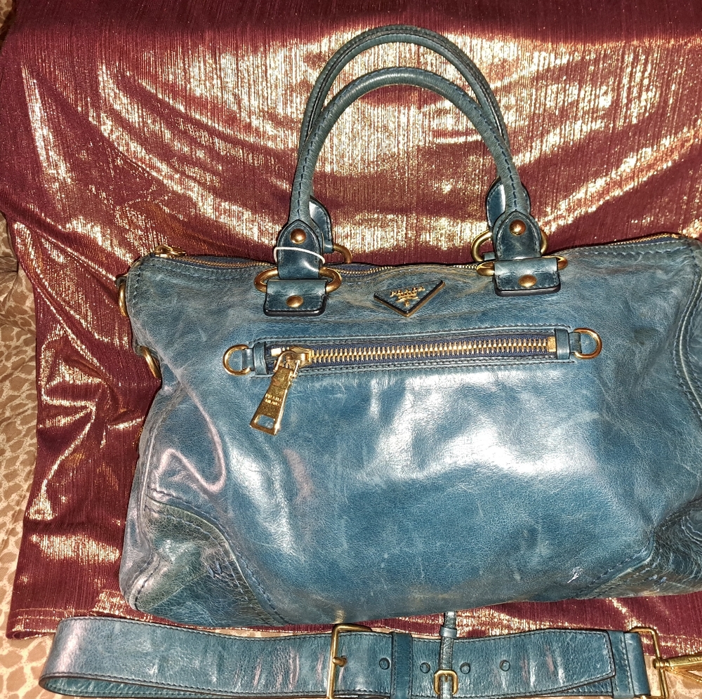 👛👜 SALE 👜👛 Prada distressed bag in ok condition with strap and hang tag